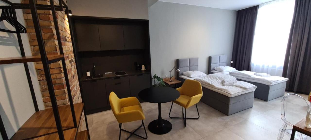 Apartsuites I Sorau Жари Екстериор снимка A studio apartment in Vilnius, Lithuania