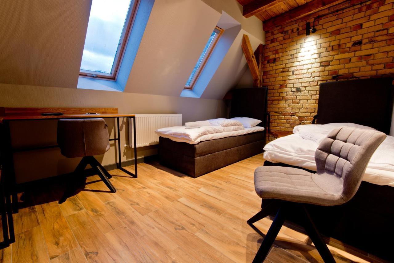 Apartsuites I Sorau Жари Екстериор снимка A room at the hotel