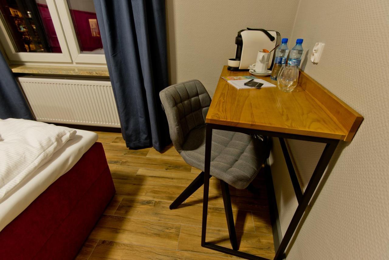 Apartsuites I Sorau Жари Екстериор снимка A Nespresso machine in a hotel room
