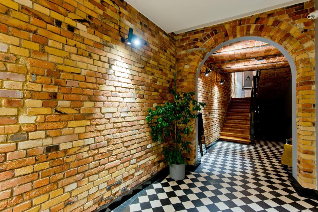 Apartsuites I Sorau Жари Екстериор снимка Interior of the building